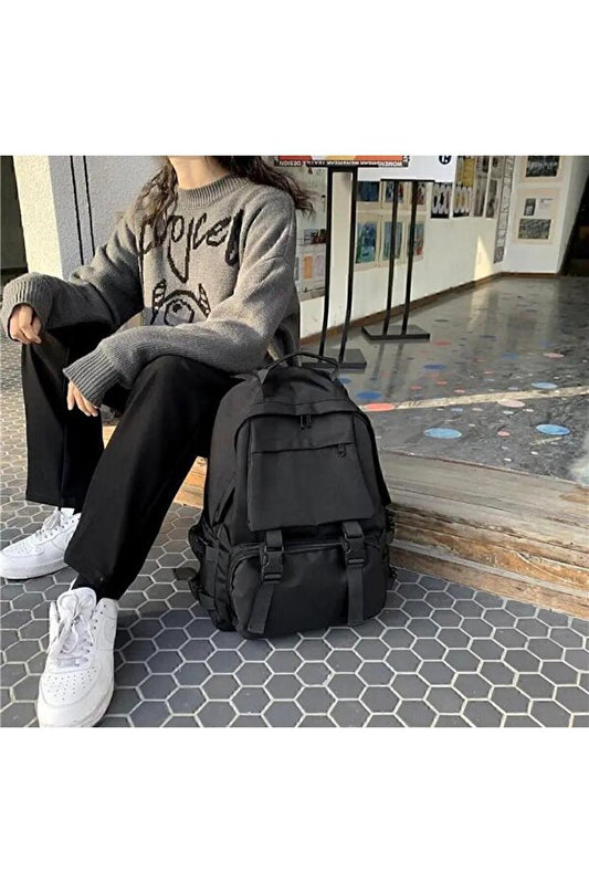Sac à dos noir Something Bag, grand format, large, avec ceinture, idéal pour l'école et comme sac pour ordinateur portable.