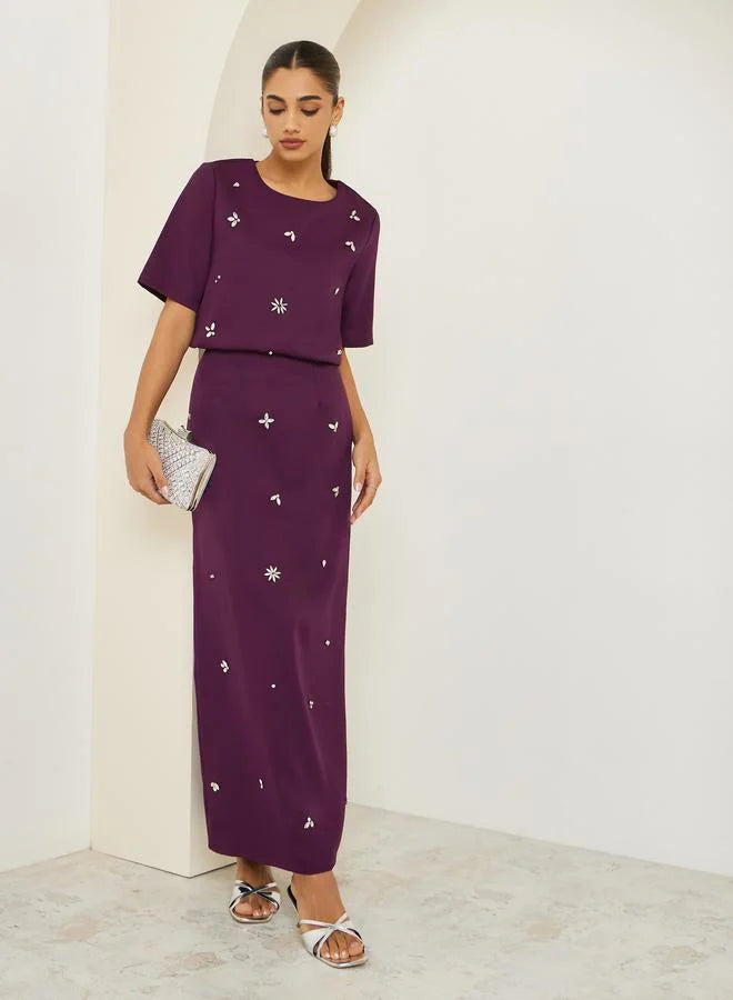 Ensemble jupe et haut violet orné pour femme