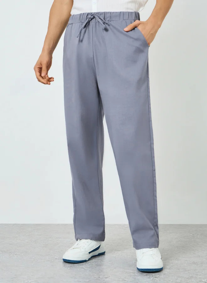 Pantalon gris uni pour homme, taille élastiquée avec cordon de serrage, coupe décontractée