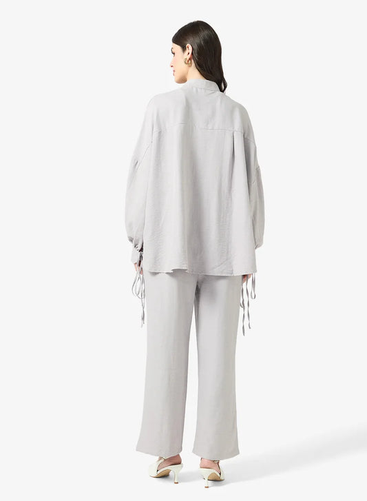 Ensemble chemise et pantalon à boutons longs