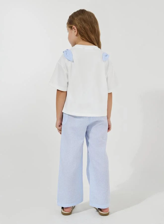 Ensemble T-shirt oversize à imprimé slogan et pantalon rayé