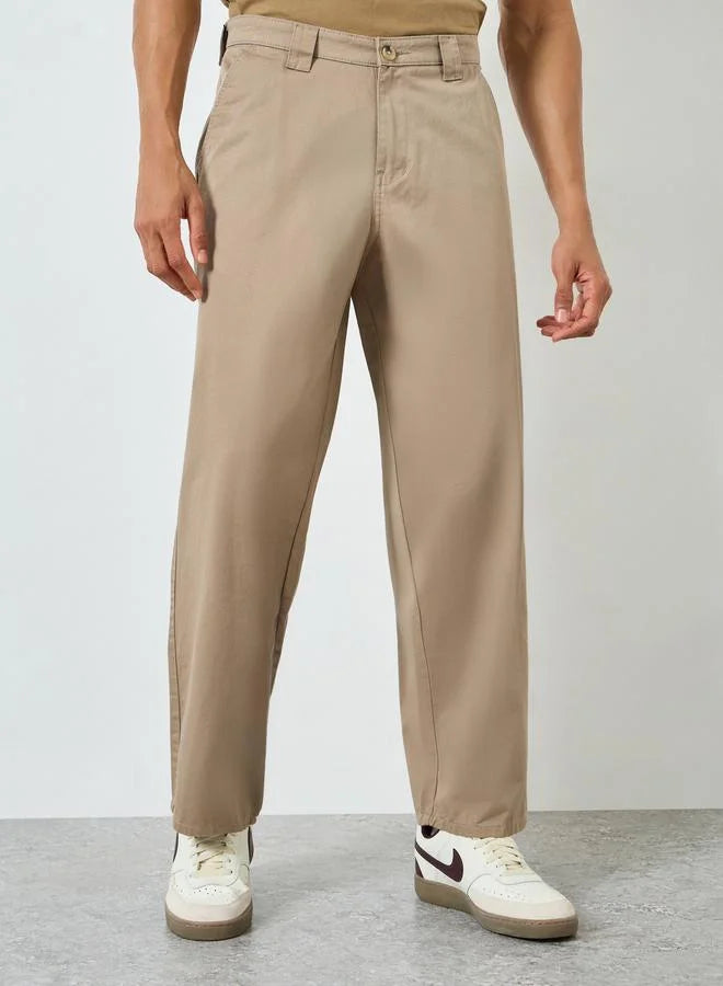 Pantalon beige ample pour homme