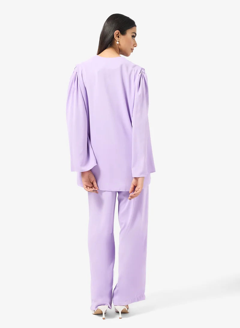 Ensemble tunique et pantalon à boutons