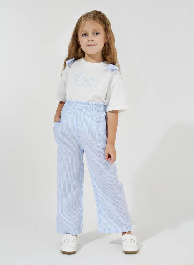 Ensemble T-shirt oversize à imprimé slogan et pantalon rayé