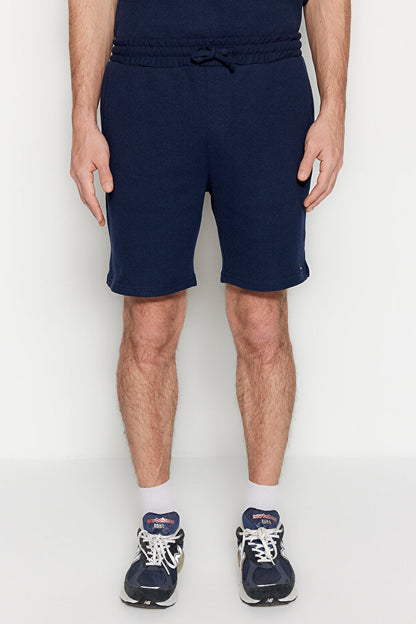 Ensemble de survêtement Trendyol Collection  bleu marine, coupe classique, col polo texturé, étiquette, référence Tmnss23Em00003