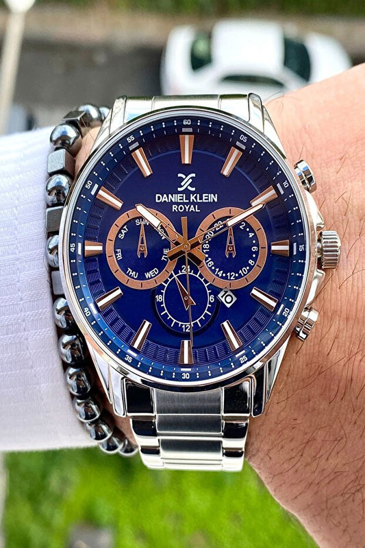 Montre homme Daniel Klein avec bracelet en acier inoxydable, garantie de 2 ans, étanche à 3 ATM.