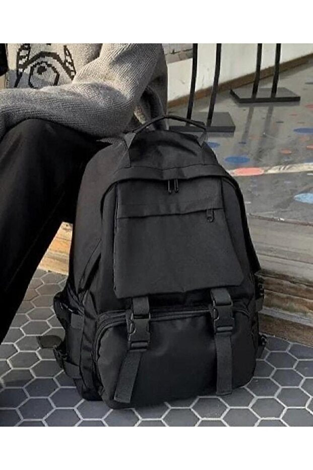 Sac à dos noir Something Bag,  grand format, large, avec ceinture, idéal pour l'école et comme sac pour ordinateur portable.