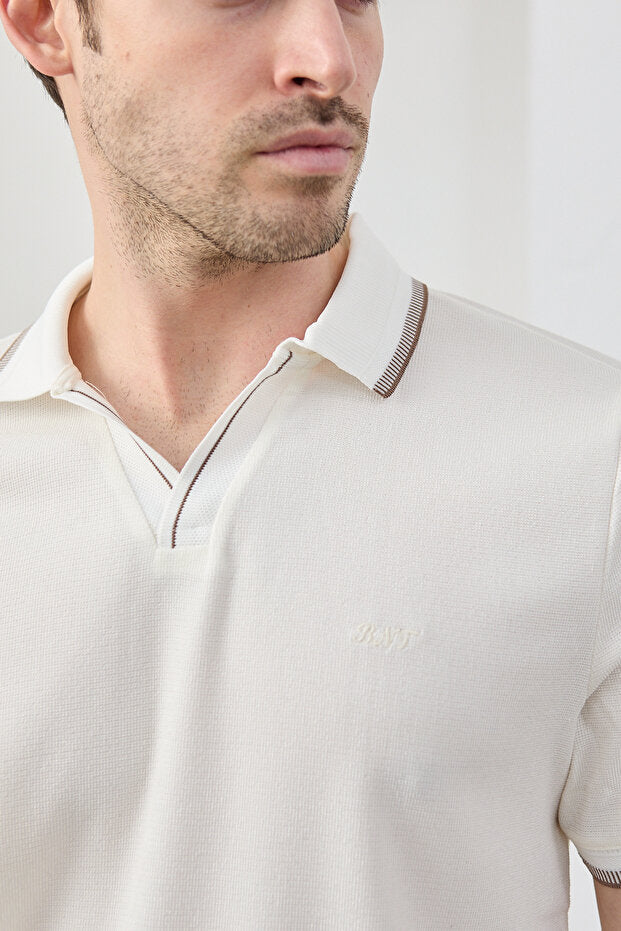 T-shirt homme RAVANELLI  , tissu en coton infroissable, coupe ajustée, col polo
