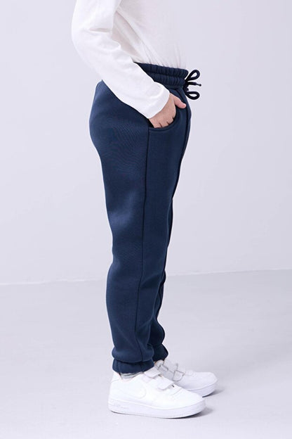 Pantalon de survêtement unisexe pour enfant Perendi , bleu marine, confortable, doublé polaire et élastiqué, avec poches