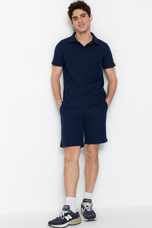 Ensemble de survêtement Trendyol Collection  bleu marine, coupe classique, col polo texturé, étiquette, référence Tmnss23Em00003