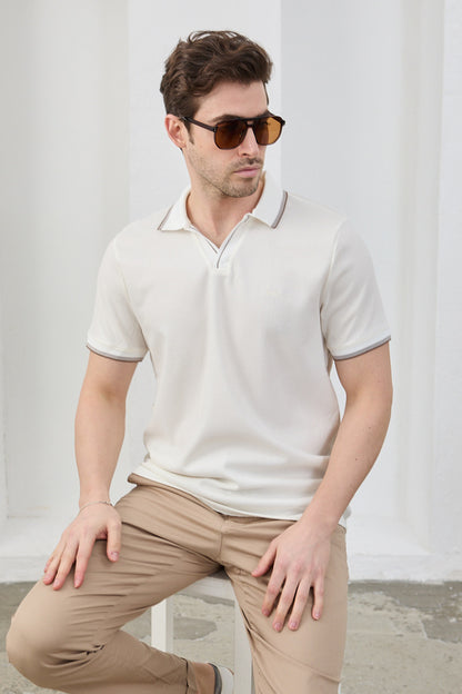 T-shirt homme RAVANELLI  , tissu en coton infroissable, coupe ajustée, col polo