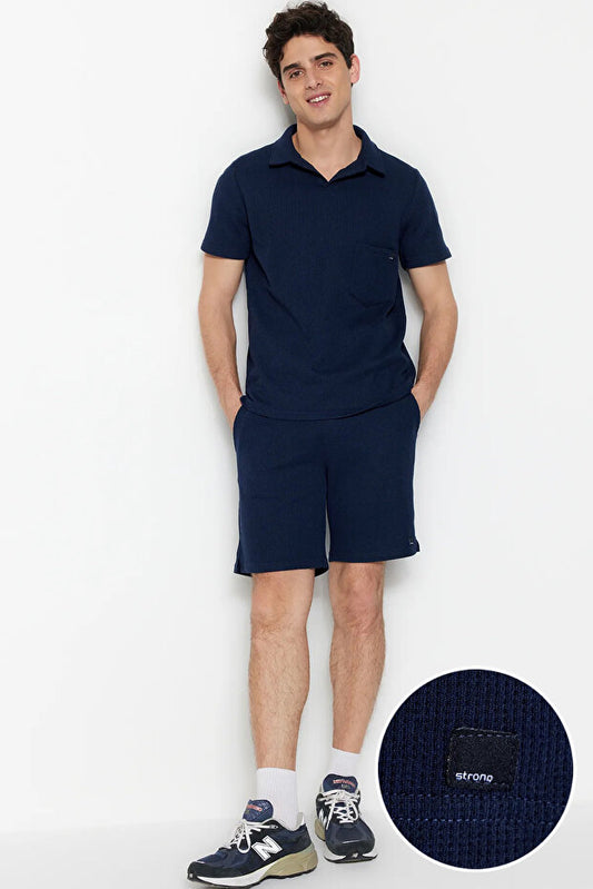 Ensemble de survêtement Trendyol Collection  bleu marine, coupe classique, col polo texturé, étiquette, référence Tmnss23Em00003