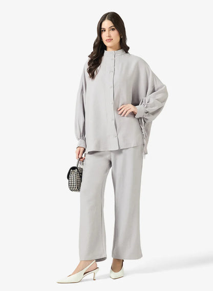 Ensemble chemise et pantalon à boutons longs