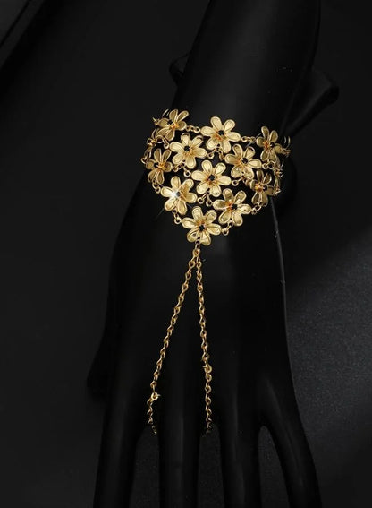 Bracelet chaîne de main floral doré