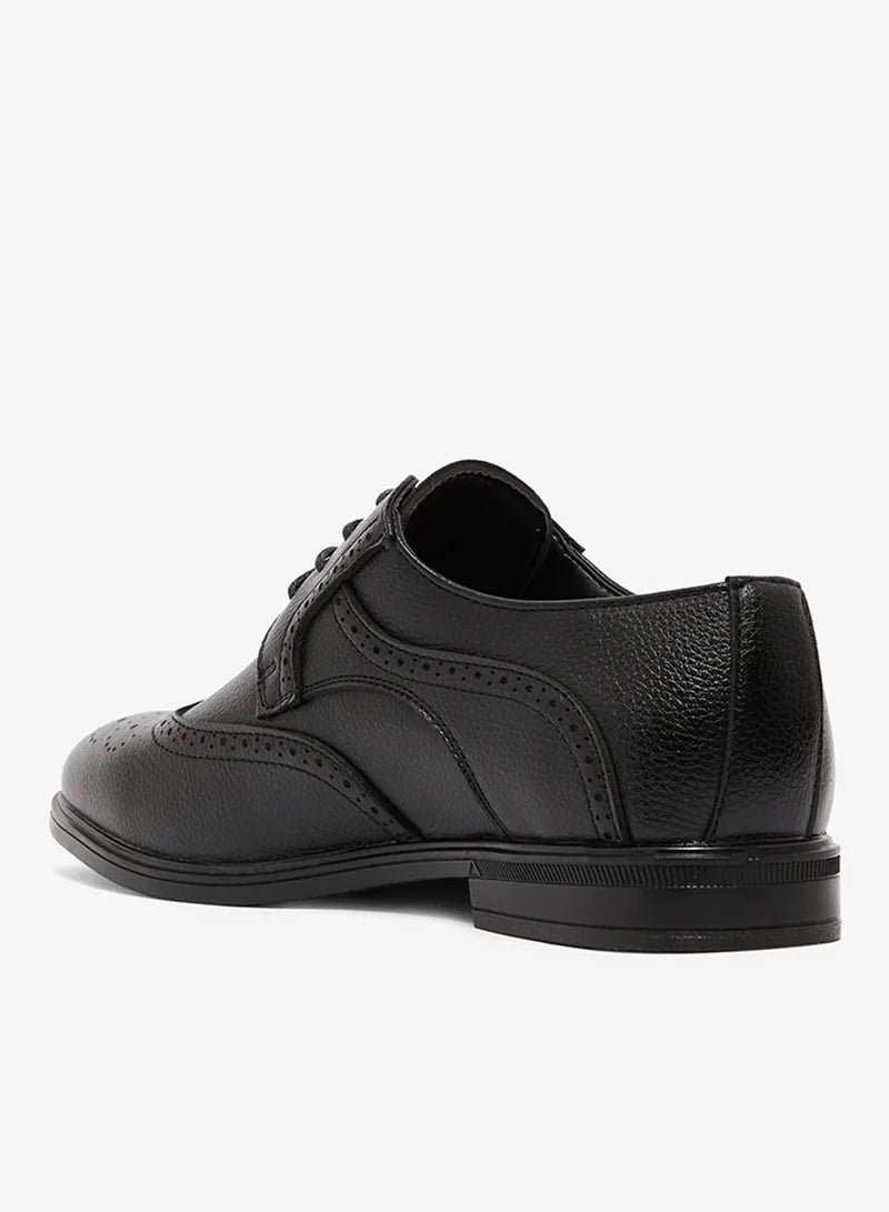 Chaussures habillées à lacets style brogue à bout golf