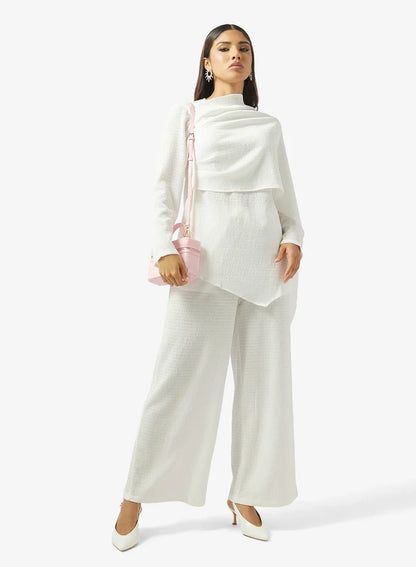 Ensemble haut cache-cœur et pantalon