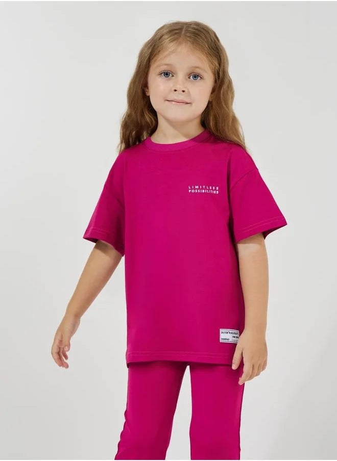 Ensemble t-shirt oversize à imprimé slogan et pantalon évasé