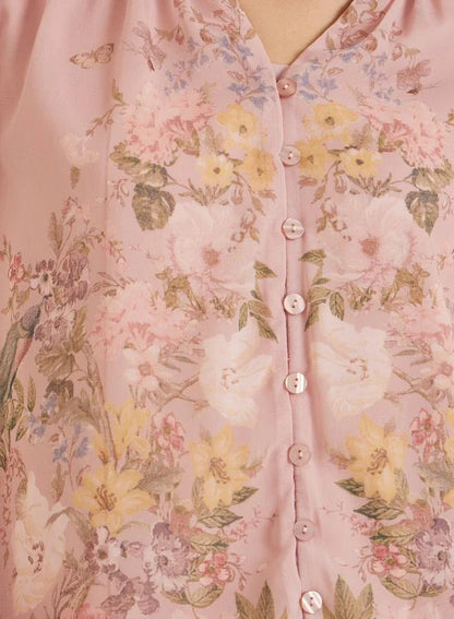 Chemisier rose clair à imprimé floral placé
