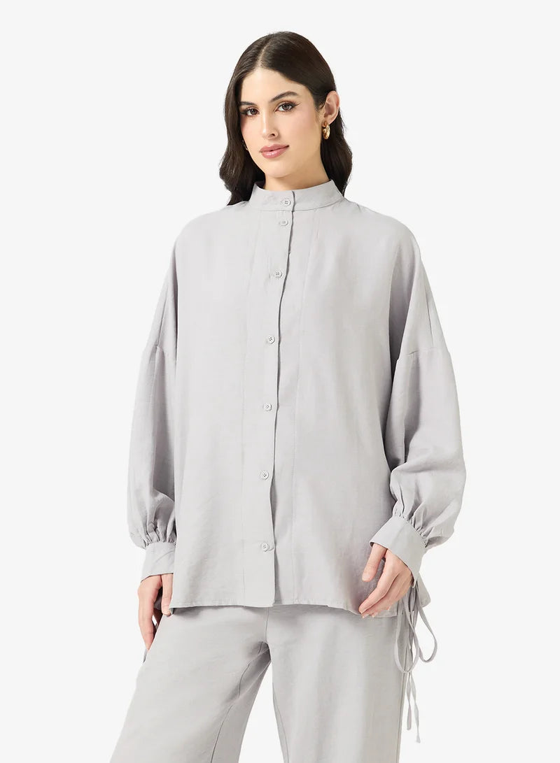 Ensemble chemise et pantalon à boutons longs