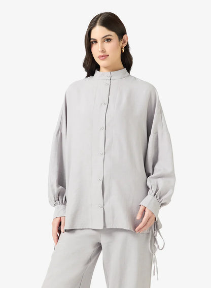 Ensemble chemise et pantalon à boutons longs