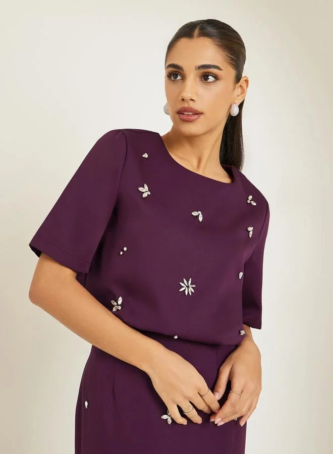 Ensemble jupe et haut violet orné pour femme