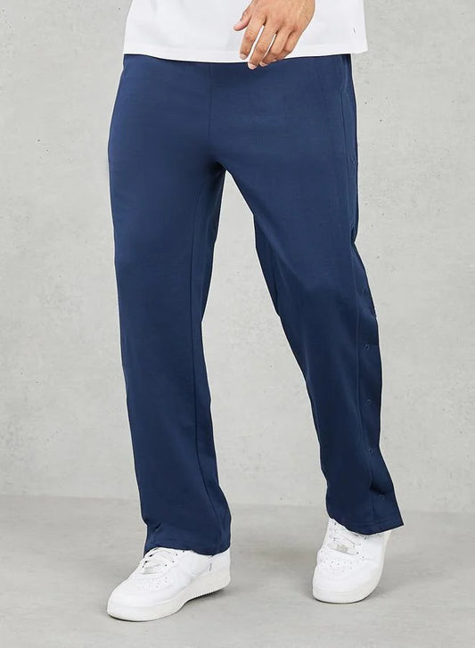 Pantalon de jogging oversize à jambes droites et ourlet ouvert avec boutons-pression