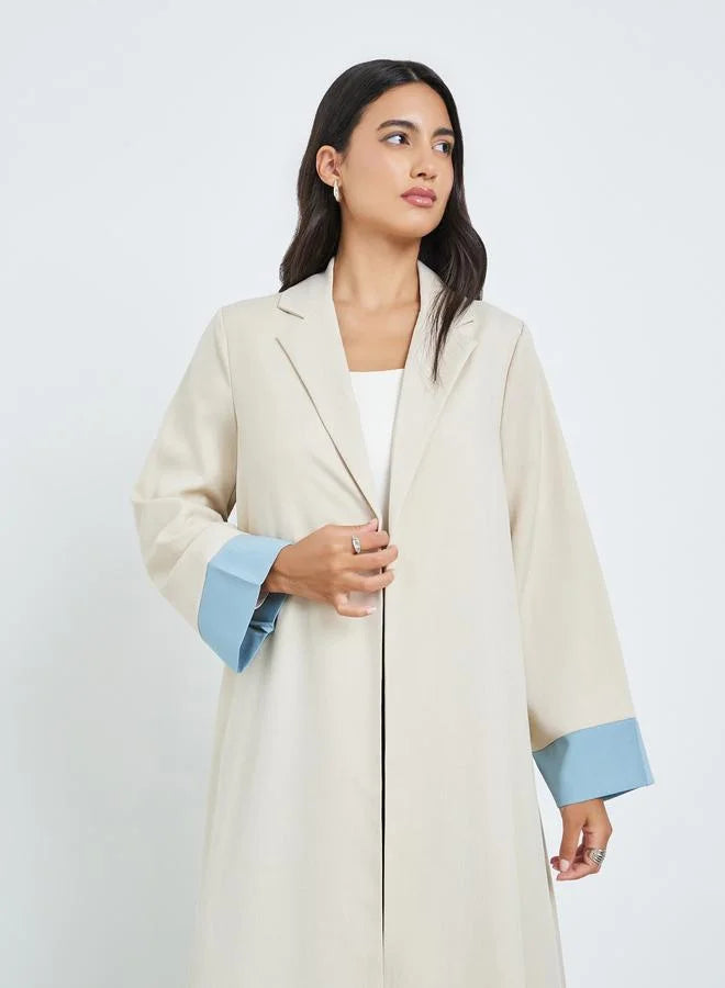 Abaya beige à blocs de couleur, coupe trapèze