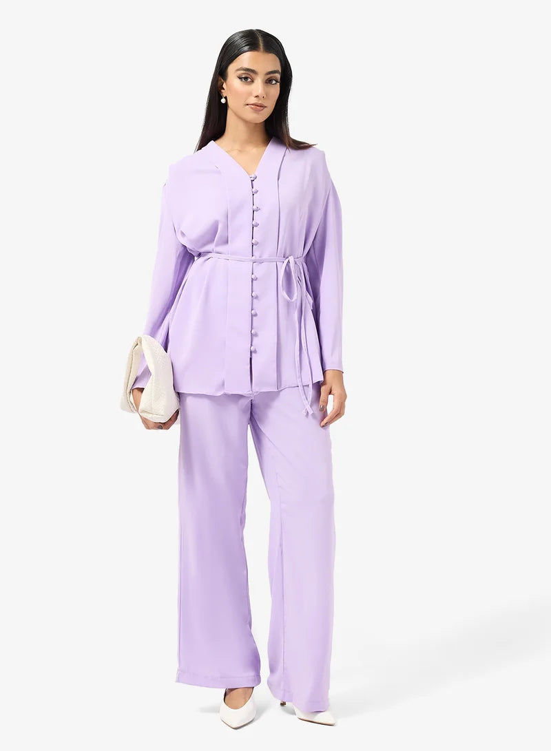Ensemble tunique et pantalon à boutons