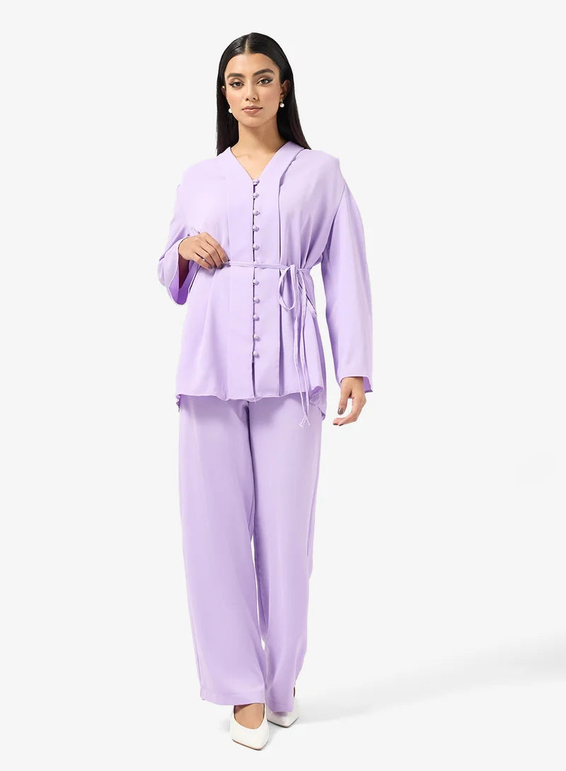 Ensemble tunique et pantalon à boutons