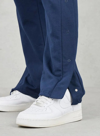 Pantalon de jogging oversize à jambes droites et ourlet ouvert avec boutons-pression
