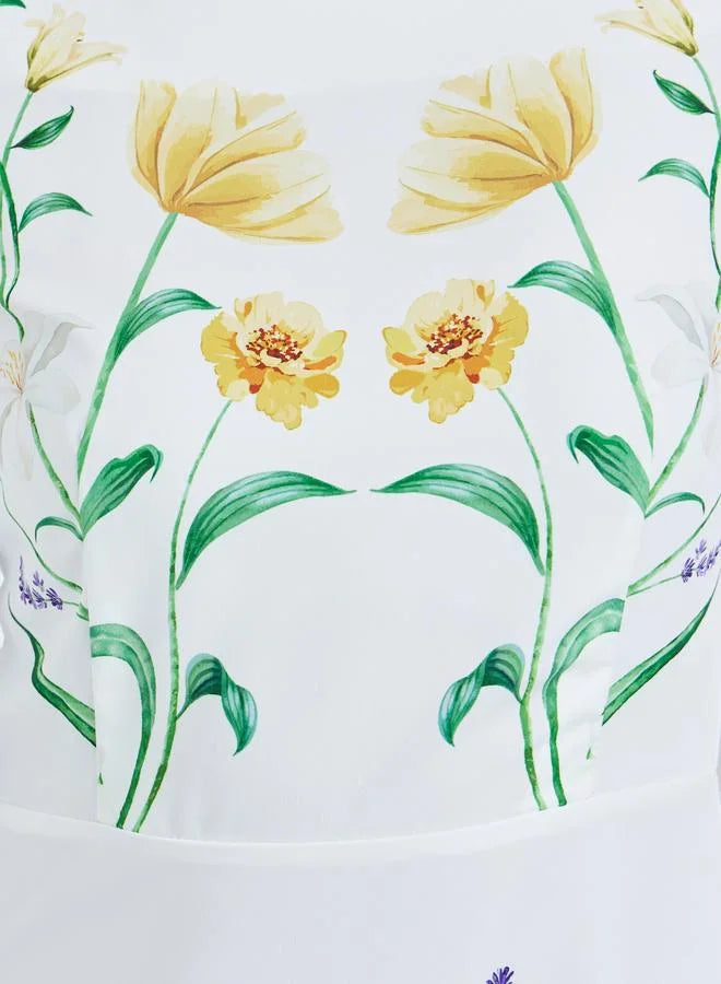Robe longue blanche à imprimé floral et manches bouffantes