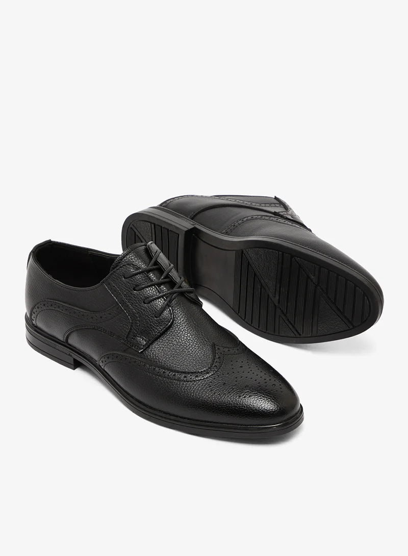 Chaussures habillées à lacets style brogue à bout golf