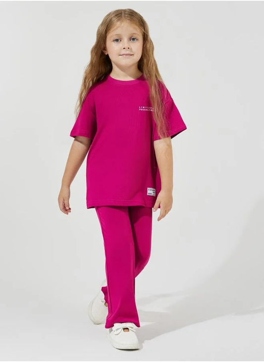 Ensemble t-shirt oversize à imprimé slogan et pantalon évasé