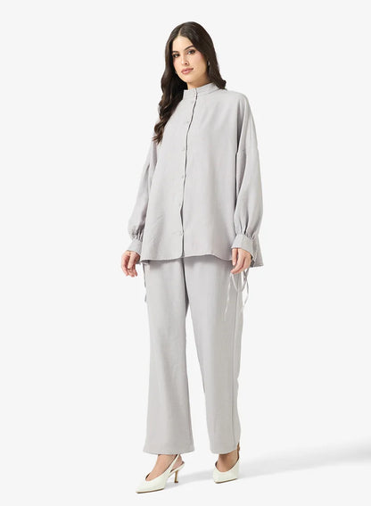 Ensemble chemise et pantalon à boutons longs