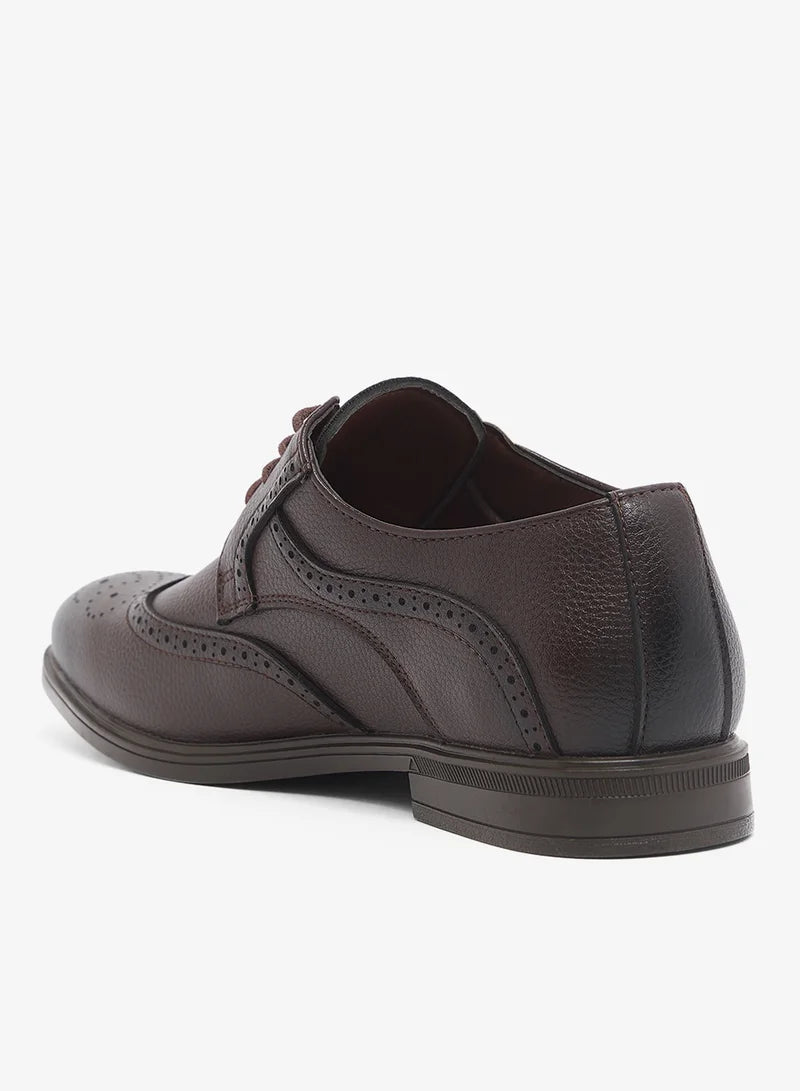 Chaussures habillées à lacets style brogue à bout golf
