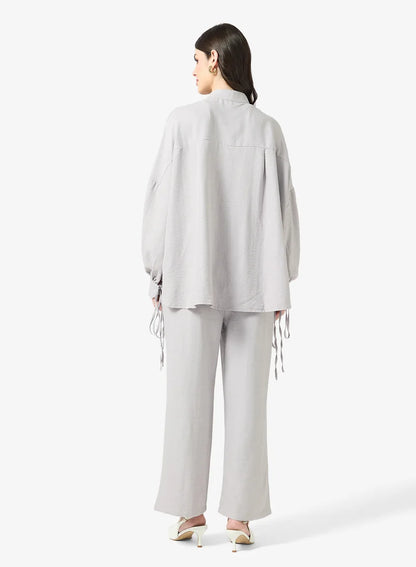 Ensemble chemise et pantalon à boutons longs