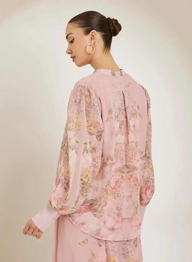 Chemisier rose clair à imprimé floral placé