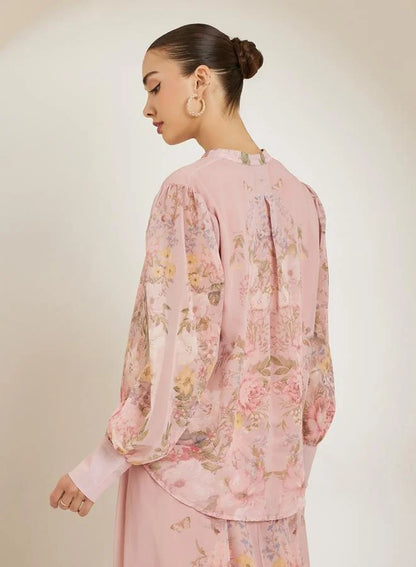 Chemisier rose clair à imprimé floral placé