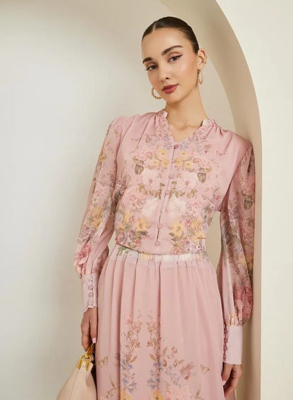 Chemisier rose clair à imprimé floral placé