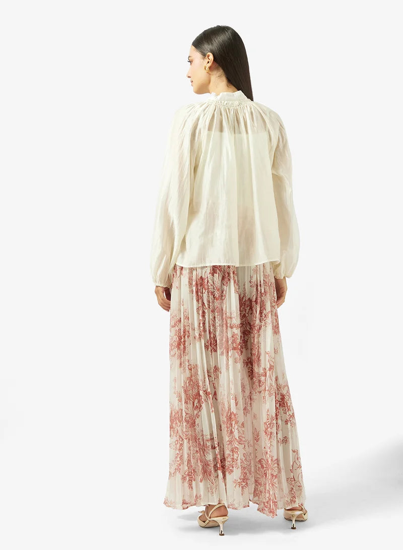 Hauts avec pantalons imprimés