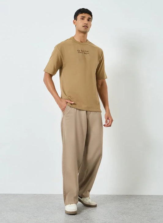 Pantalon beige ample pour homme